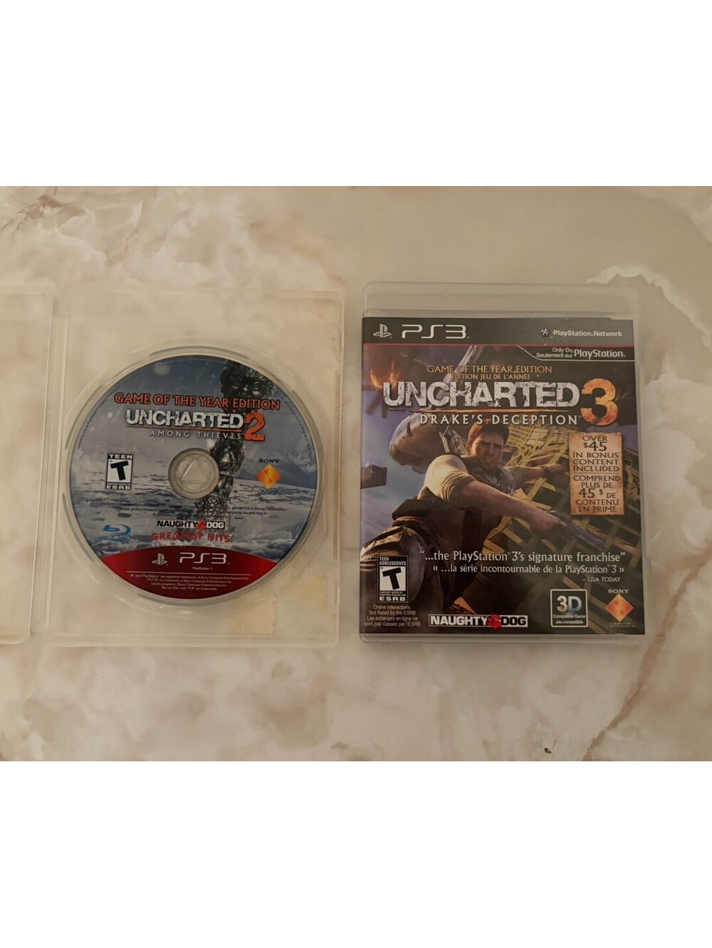 Uncharted 2 & 3 PS3 Game Lot GOTY Drake's Deception CIB Among Thieves Disc Only